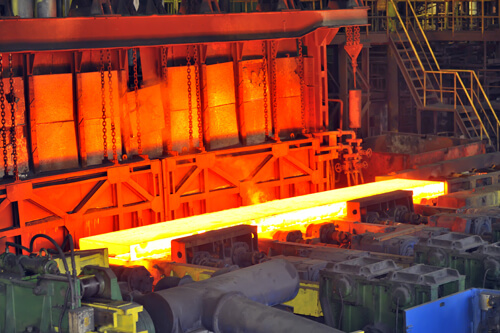 Hot steel on conveyor in plant